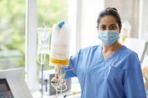 Nurse with dropper