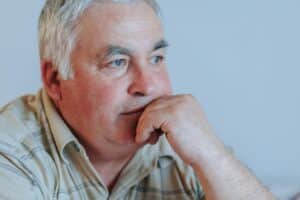 Contemplative Moments Portrait of a Thoughtful Senior Man at Home