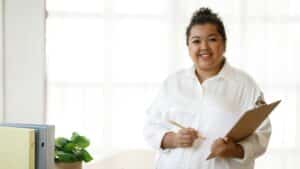 Obese young mixed race lady counselor working at office