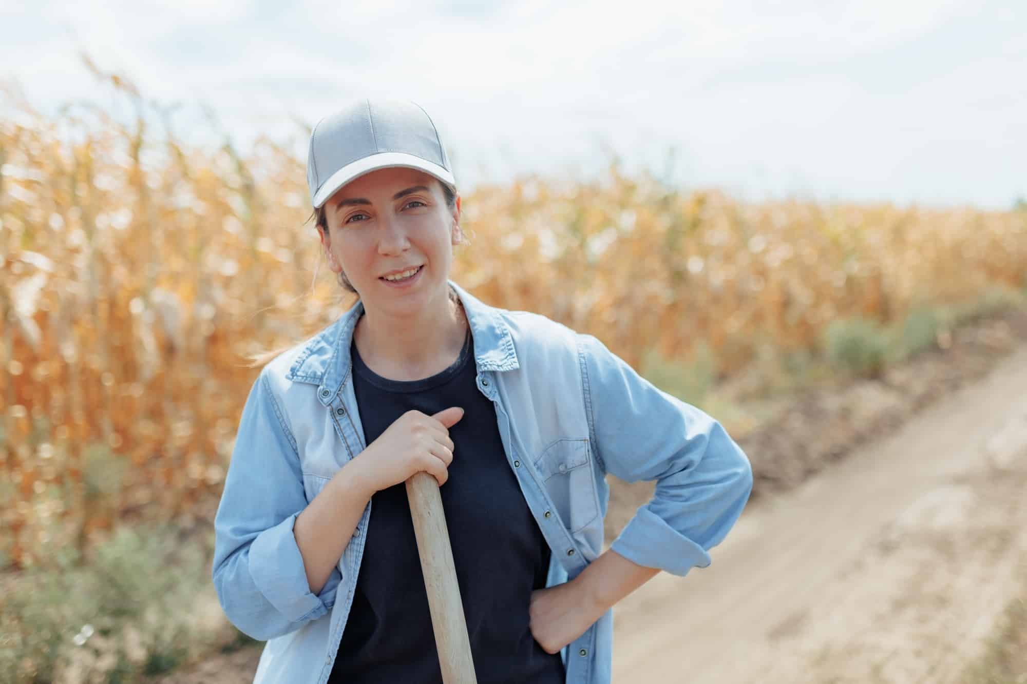 Rural Woman Enjoying the Bright Day in the Field Surrounded by Corn